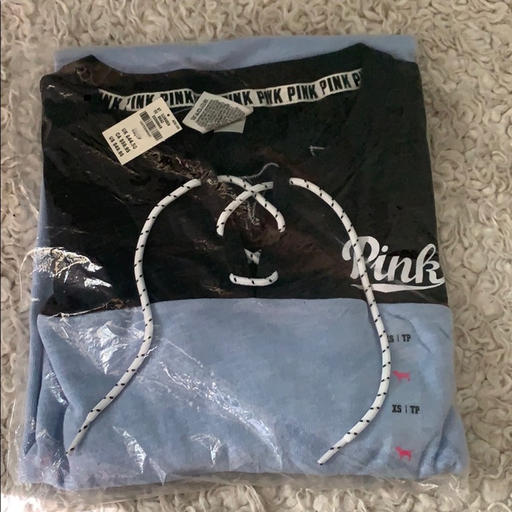 NWT. PINK XS light sweater shirt.